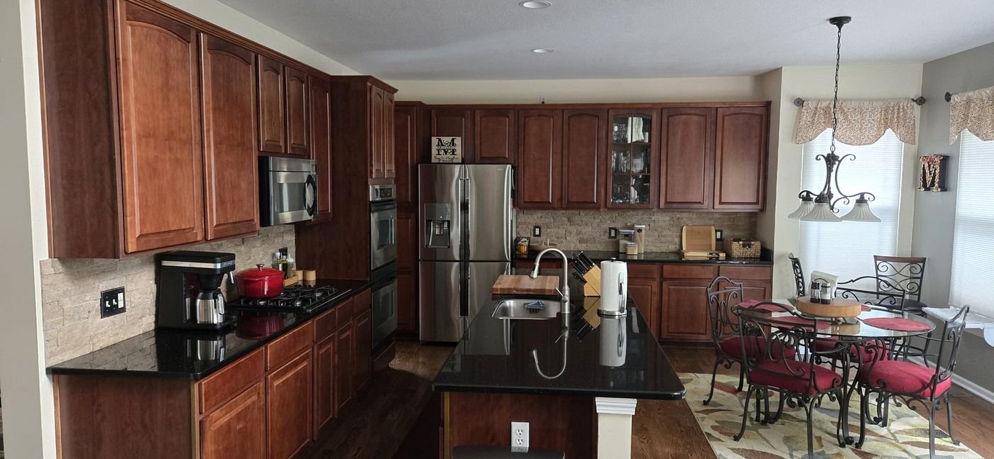 Kitchen island and cabinetry before accent lighting was installed